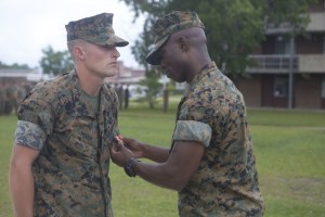 Marine awarded Navy and Marine Corps Medal for pulling man from burning vehicle
