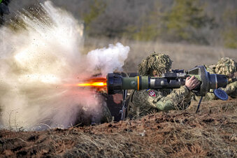 Putin orders Russian troops into eastern Ukraine as Biden blocks US trade there