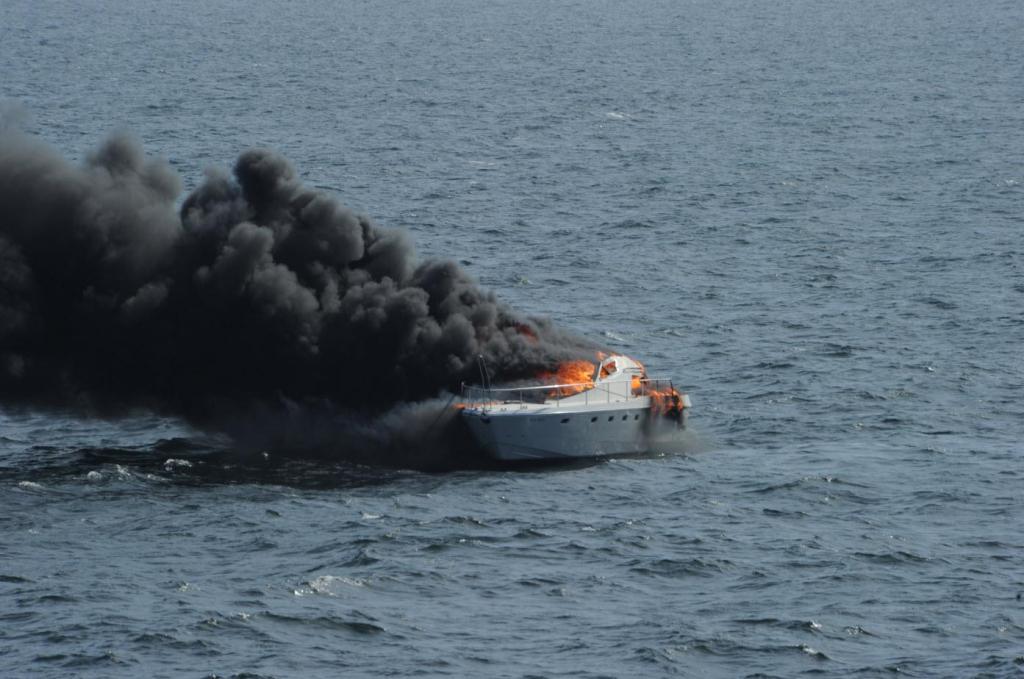 Navy: Warship Ross rushes to rescue mariners from burning boat