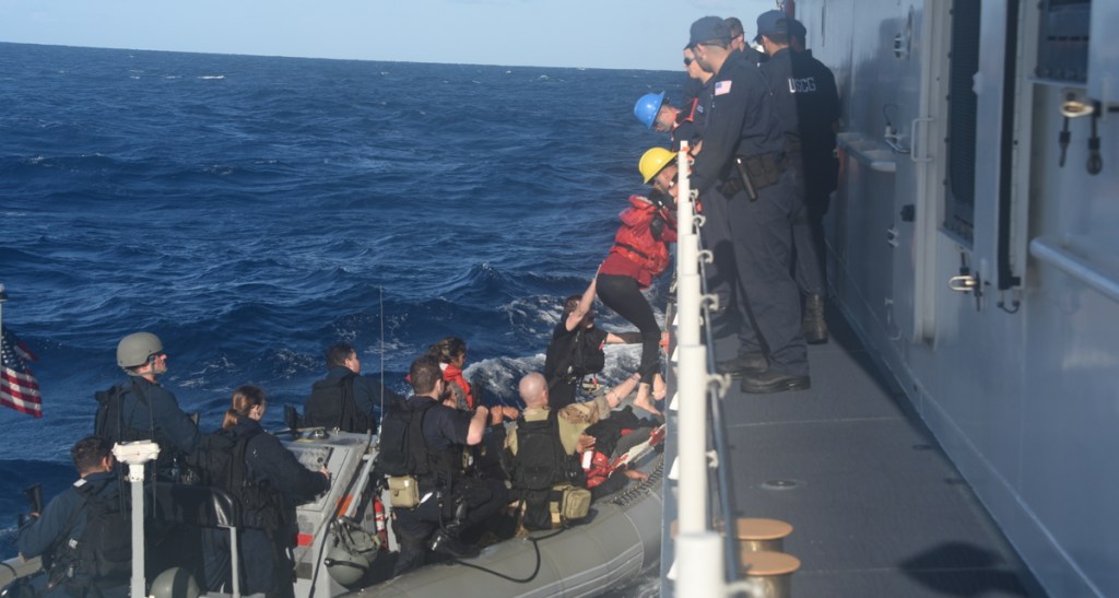 Warship rescues passengers off dilapidated sailboat