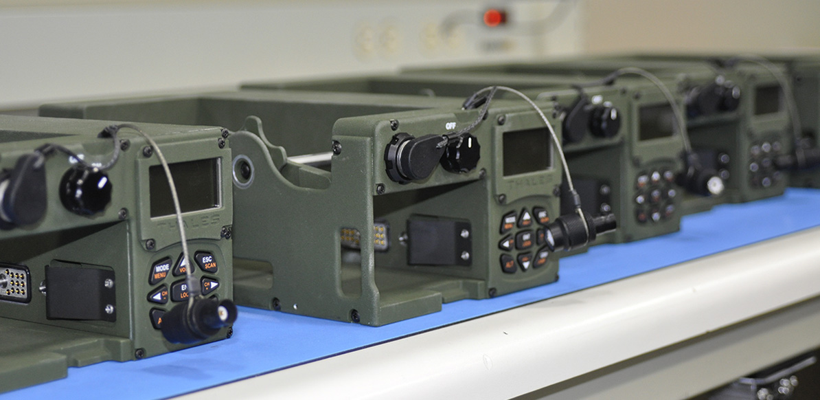 Workers in Clarksburg, Maryland, pump out a wide range of components and gear: radios, chassis, battery packs, fuzes and more.