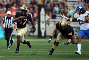 Woolfolk scores 2 TDs in 4th, Army beats Buffalo 21-17