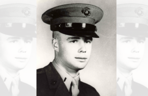 Refusing evacuation, this Marine packed dirt into his wound and continued to fight