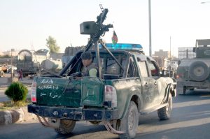 Official: Afghan forces take back city threatened by Taliban