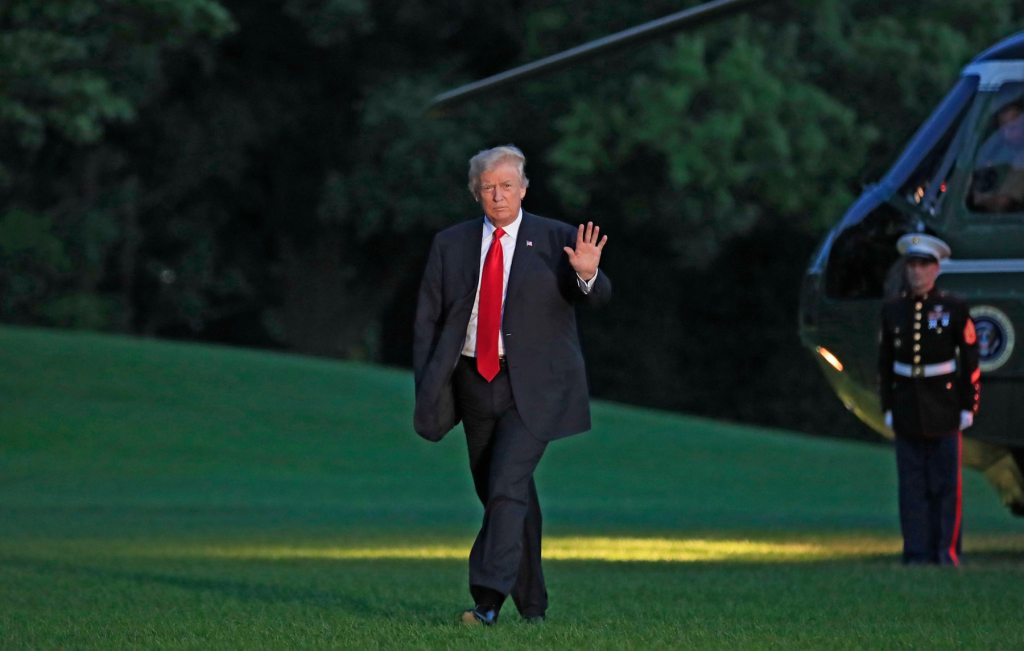Watch President Trump retrieve a Marine’s cover