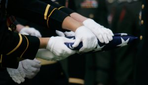 American service member killed in Afghanistan as Taliban fights to retake key city