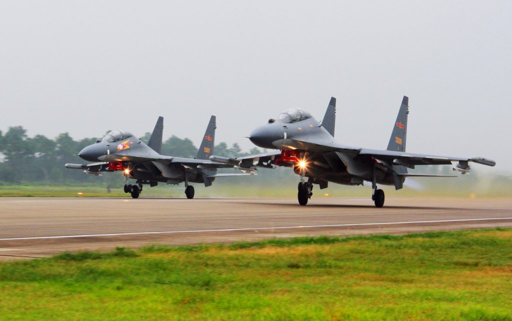 Chinese fighters buzz Air Force plane over East China Sea