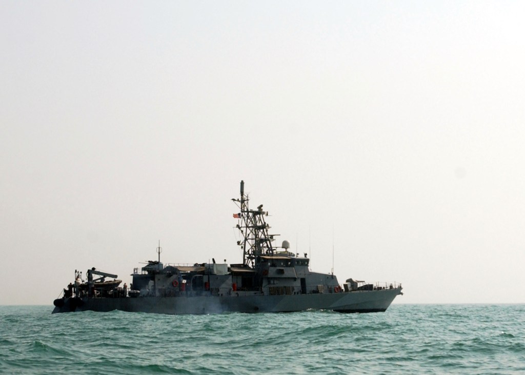 Official: 7 Iranian boats came after U.S. ship in the Persian Gulf