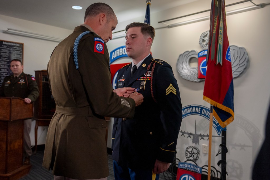 Army medic receives award for fending off shooter, saving life