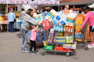 Stretch your grocery dollars at May commissary sidewalk sales