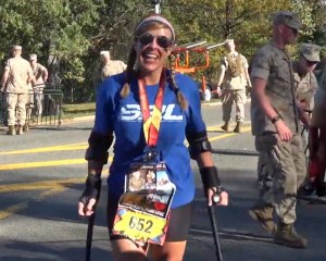 Recon Marine’s girlfriend finishes marathon on crutches after accidents left her disabled