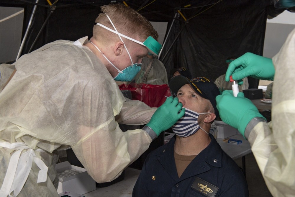 Pentagon, reacting to Biden order, working on plan for mandatory COVID-19 vaccinations