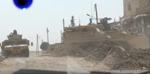 US Stryker vehicles lead Kurdish reinforcements into Raqqa