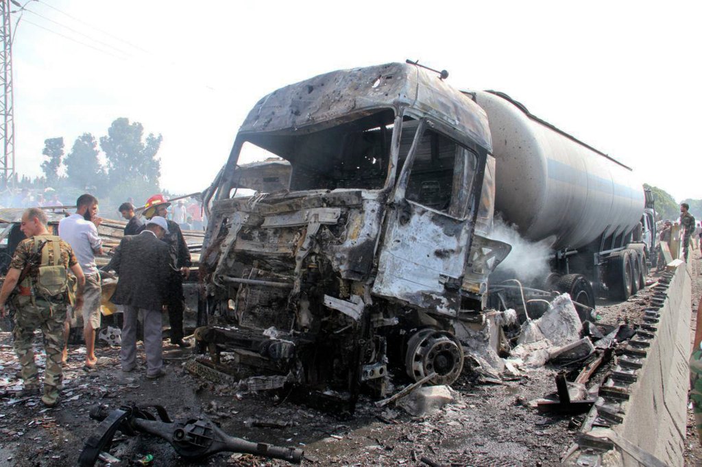 Wave of ISIS-claimed bombings in Syria kill at least 48