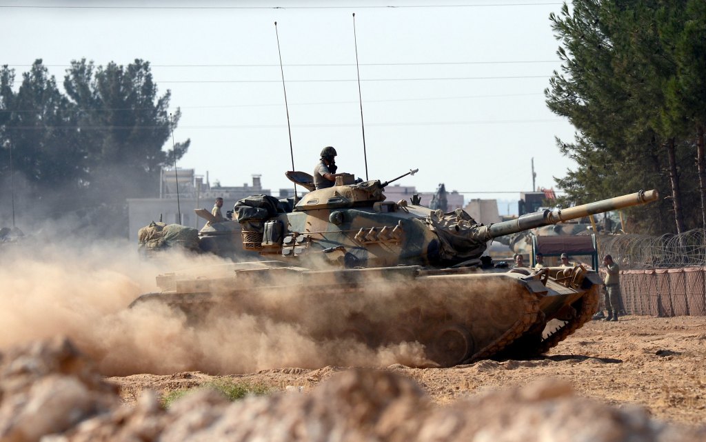 Uneasy truce holds between Syrian Kurds, Turkey