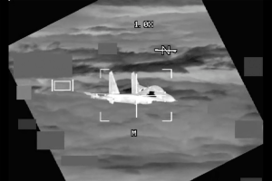 Watch Chinese fighter jet get within 10 feet of U.S. bomber in-flight