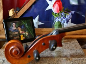 A sister uses her gifts to send messages to her brother, a fallen soldier